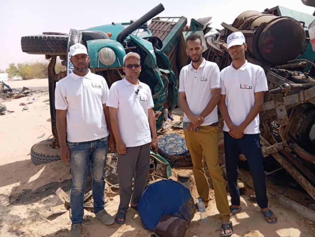 صورة لأعضاء الحملة عند أحد الحواث 